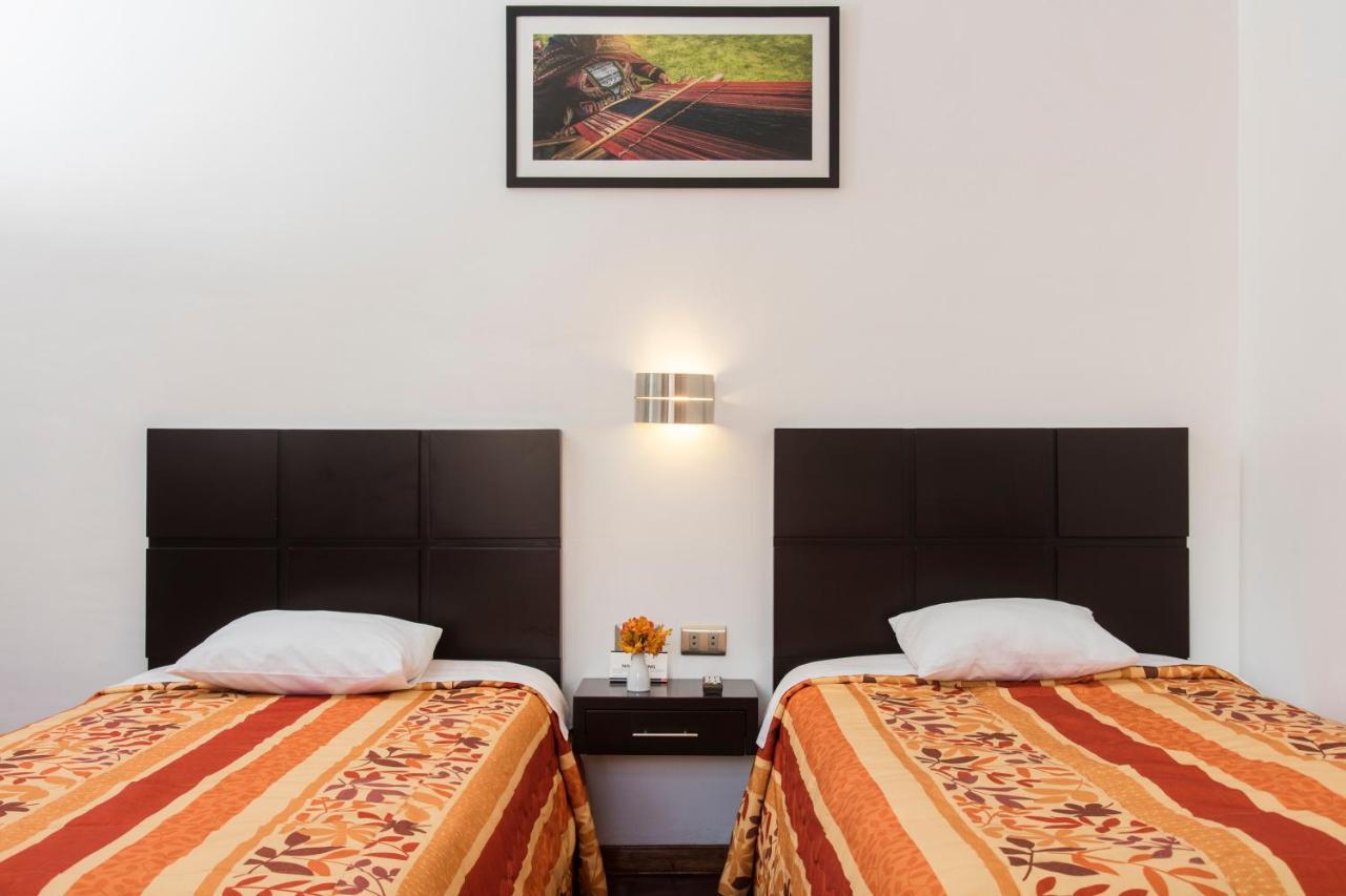 Hostal & Apartments El Triunfo Куско Екстер'єр фото