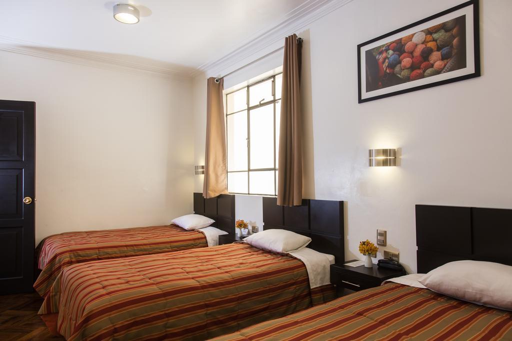 Hostal & Apartments El Triunfo Куско Екстер'єр фото